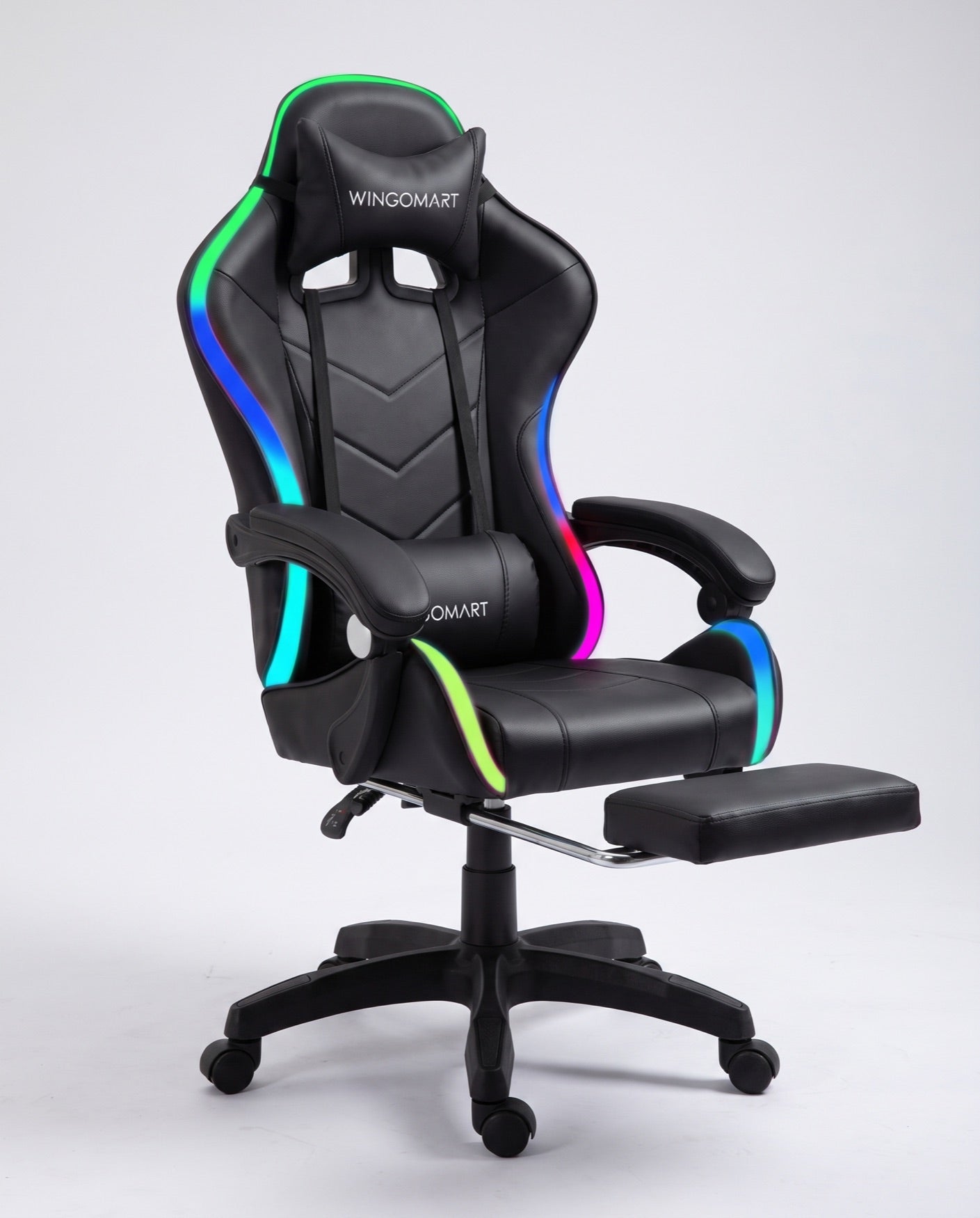 RGB PRO chair with adjustment points marked: armrests, reclining backrest, and extended footrest